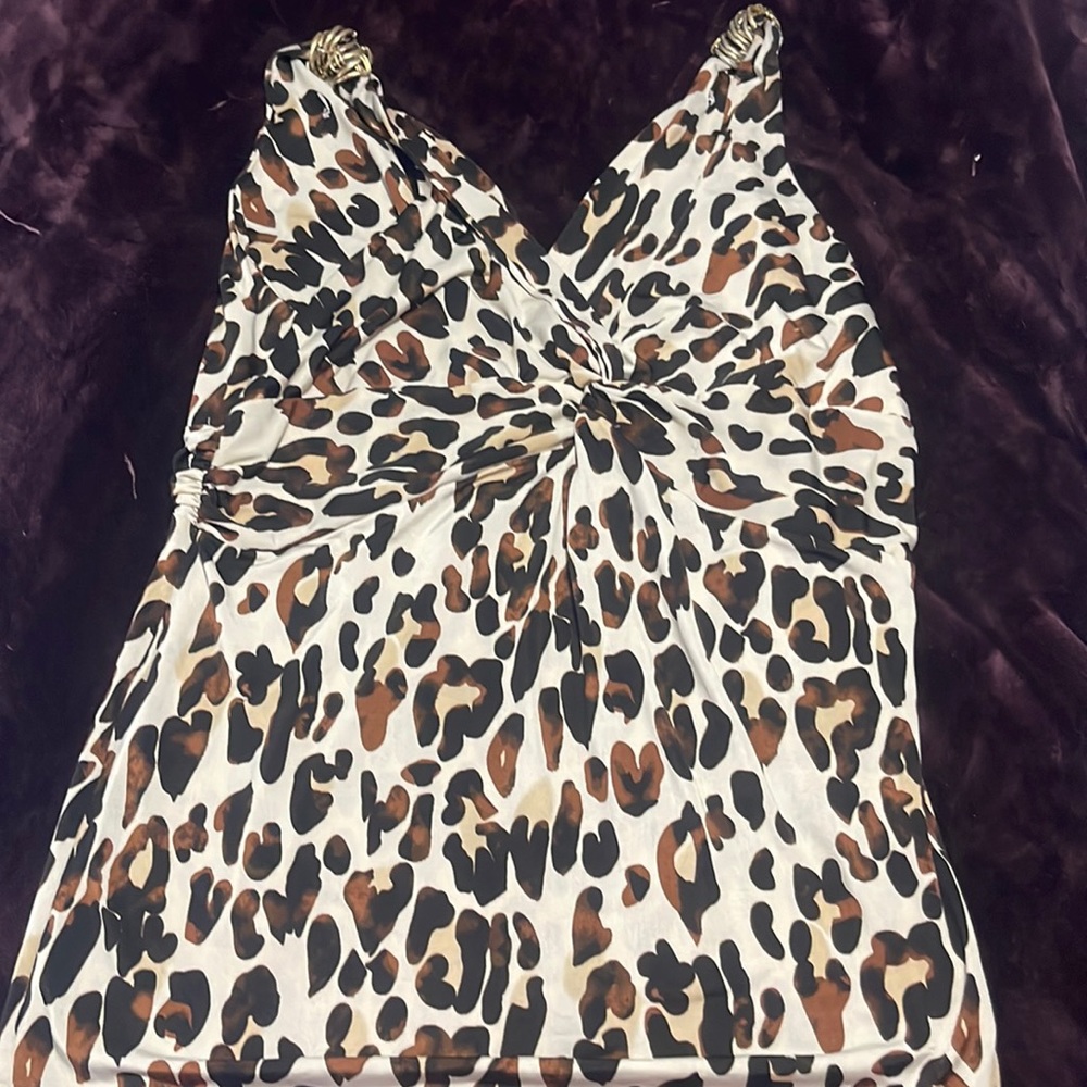 Sleeveless cheetah print top. Excellent condition